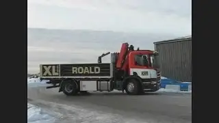Крана манипулятора с горки по скользкой дороге.