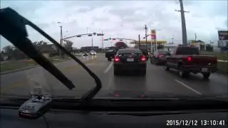 Truck Spins Out on Wet Road