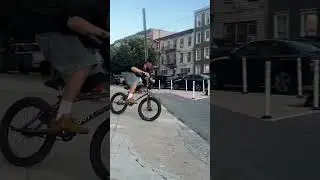 Barspin to wallride on a rail?! #bmxstreet #merrittbmx
