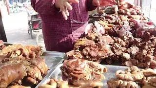 Aunt Kaifeng puts a cart of braised meat, limited to 30 pig heads per day！