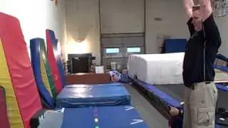 Mike T Nelson attempts a handstand