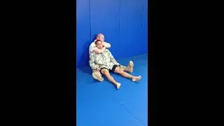 Strength coach gets rear naked chocked and passes out