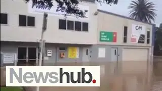 'Everything is full of water': Locals muck in as flash flooding hits Waihi Beach residents | Newshub