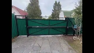 Ворота с оригинальным решением.Откатные ворота с балкой посередине.