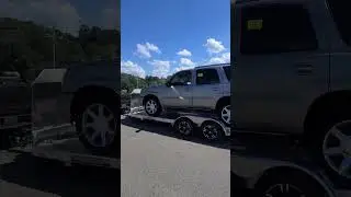Cadi Convertible towing another Cadillac Escalade 