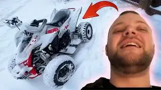 Yura Volkov starts his quad bike. Heavy snowfall in Krasnodar.