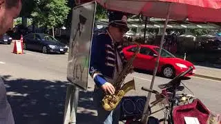 Street musician plays Original Star Trek theme on saxophone in Portland