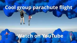 A group of people flying with a parachute -  Beautiful flight - Parachute