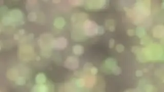 Free HD Looping Particle Background - Soft Pastel Colors