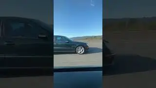 Green W211 E55 AMG roller