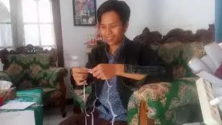 Cara Menembuskan Kertas dari Kepala Sampai Ujung Kaki