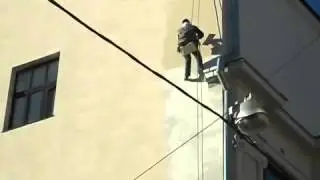 Шпаклевка современного фасада на высоте