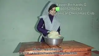 Mechanical christmas crib - cooking woman