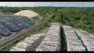 Piles of wooden logs at the sawmill