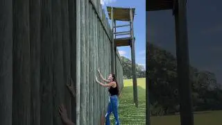 How tall were the walls at Andersonville Prison? 