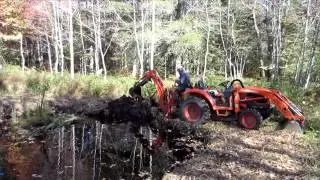 Wayne Croft digs a pond