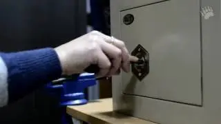 Opening a safe with a self-impressing key