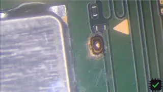 Digging out and soldering to Nintendo Switch OLED DAT0 via for a solid permanent contact