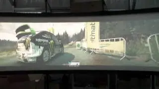 Huge Curved Projection Video Game Screen on a 3 projector edge blended curved screen