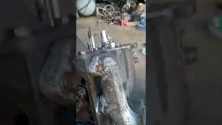 Assembling the engine of the Fenshaw 180 minitractor