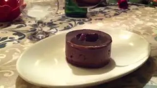 Pouring ganache over the 8 textured chocolate cake