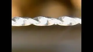 Proxon 6868LU mandren ucuna takilmis 0.8mm matkap ucundaki salgiyi mikroskopla gozlemlemek.