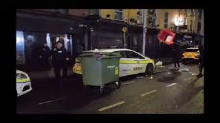 Multiple vehicles on fire amid clashes with riot police in Dublin#ireland