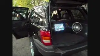 Custom sound system with fiberglass panels on the 2002 Grand Cherokee- Type X Alpine, CVX Kicker