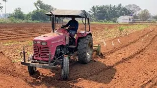 Mahindra Tractor with Rotavator working in field - Rotary Tiller machine