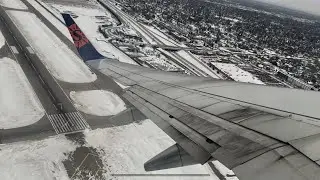 Takeoff From Snowy Minneapolis - Sun Country B737-800