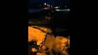 smashing a frozen pumpkin with a sledgehammer