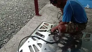 CNC Plasma Cut Decorative Panel - Removal of dross by pneumatic chisel