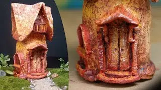 Toy house made of clay and a glass jar. DIY Fairy house Lamp Using pottery clay