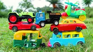 On the tree auto rickshaw, tractor, Jcb, crane, dumper, truck body parts finding flower tree | toys
