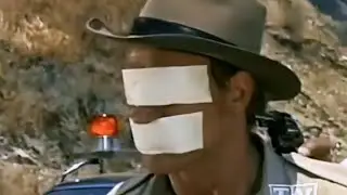Cop Gagged and Blindfold