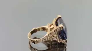 Эксклюзивное кольцо из красного золота 585 пробы с Александритом 38.6 ct и фианитами.
