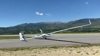 Motorglider Schleicher ASH-31Mi taking off from Cerdanya Aerodrome, Catalonia