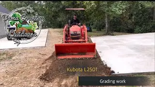 Kubota L2501 grading around concrete slab | dirt work |
