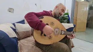 عزف مدرس العود الاستاذ فادي يعزف على عود من فئه Q صناعه مصطفى بكر