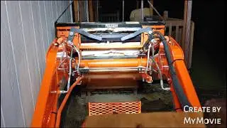 Kubota B2301 & PFL1242 Landpride Pallet Forks: Moving wood pellets.