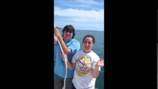 Venture Crew 56 hoisting sail - mainsail
