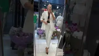Женский белый брючный костюм
