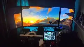 beautiful Milford sound sunset on triple monitor setup.