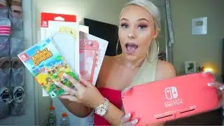 I'VE NEVER BEEN HAPPIER... UNBOXING THE CORAL NINTENDO SWITCH LITE 😍 + ACCESSORIES!
