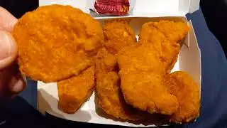 Trying the new McDonald's Spicy Chicken McNuggets in my Tesla Model 3