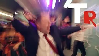 The groom crawling on my knees to the bride. Dance flashmob from the groom and guests .