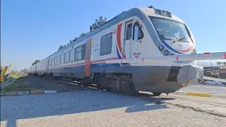 İZMİR-DENİZLİ TRENİ GERMENCİK SANAYİ SİTESİ HEMZEMİN GEÇİT BARİYERLERİNDEN GEÇİŞ...