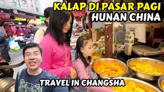 CUISINE AT THE CHANGSHA MORNING MARKET, HUNAN, CHINA WITH AN INDONESIAN FAMILY
