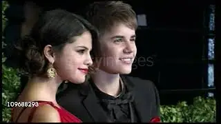 Justin Bieber & Selena Gomez pose for photos at Vanity Fair party red carpet