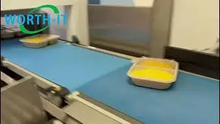 Pre-glued sleeve machine inline vacuum seal work at fresh ready meal customer workshop